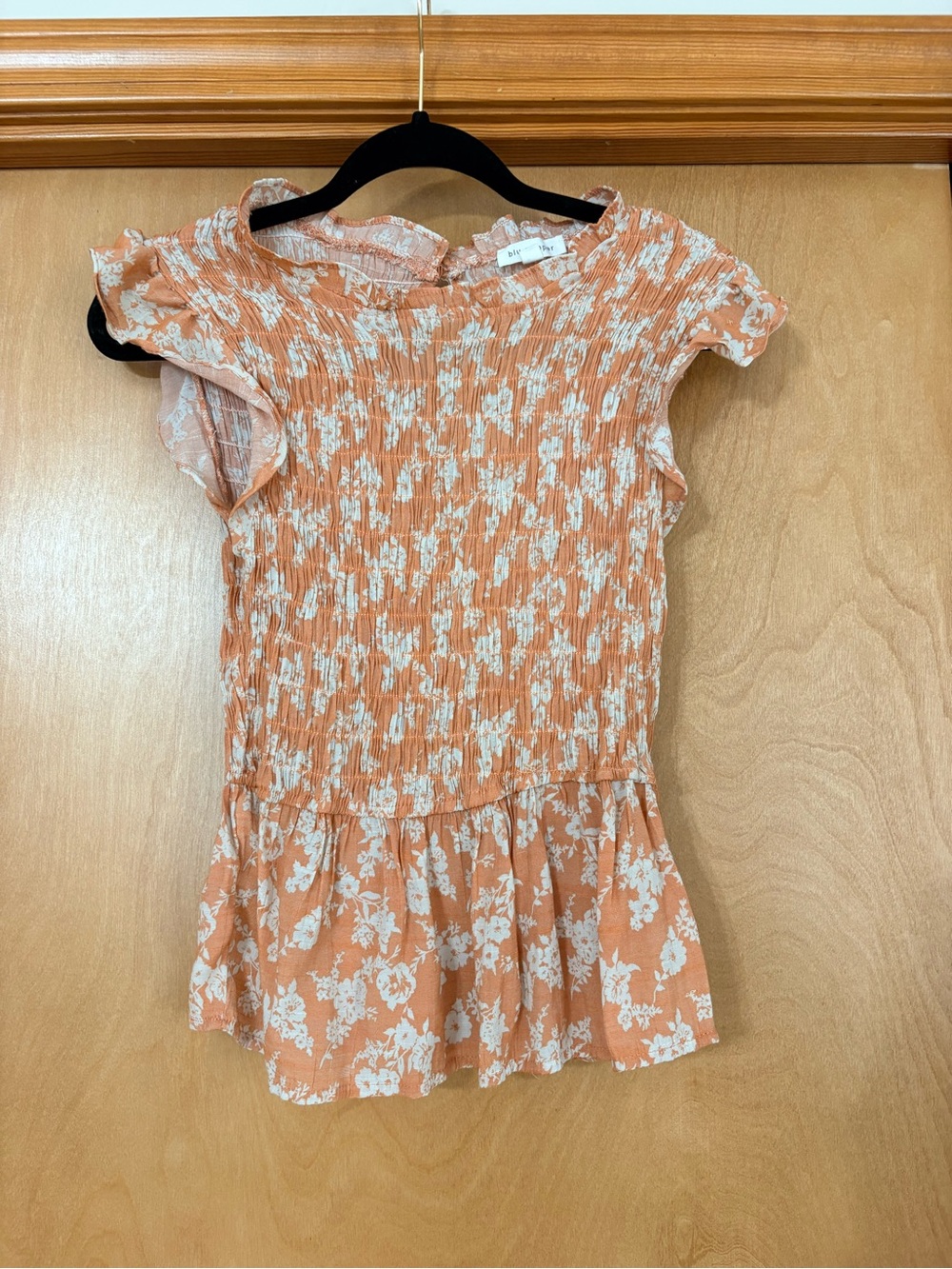 Peach Floral Smocked Peplum Top